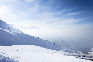 Dramatic clouds with mountain and snow in the evening shot