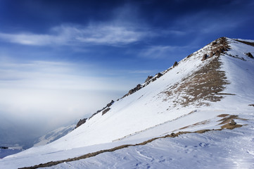 Winter snow covered mountain peaks in Europe. Great place for winter sports