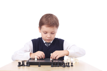 Boy playing chess
