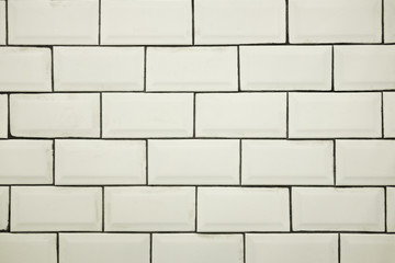 Beige color tile texture wall.