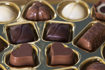 Golden box full of chocolates