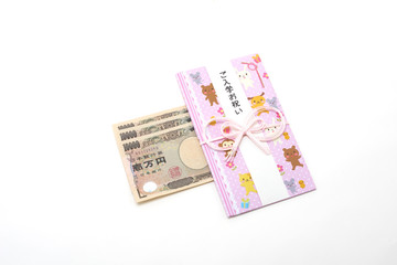 白背景の入学祝いの袋と一万円札　Celebration bag with white background and 10,000 yen bill