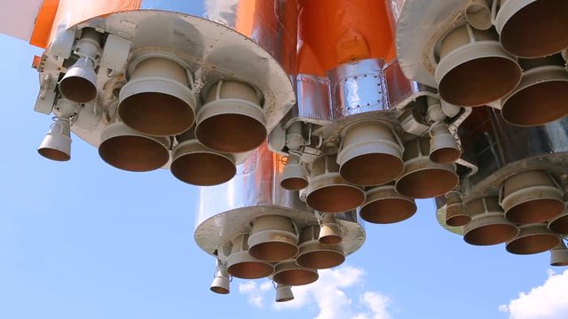 Space rocket engines of the russian spacecraft over blue sky background