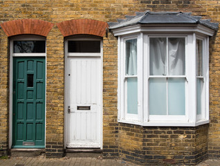 Traditional English house yellow door entrance
