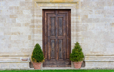 Fototapeta na wymiar Detail of the door of the church of San Biagio in Montepulciano, Tuscany, Italy