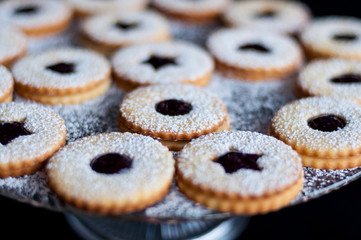 Shortbread cookies with jam and sugar powder