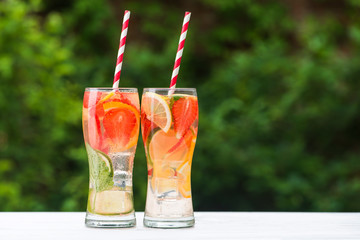 two glasses of fruit mojito
