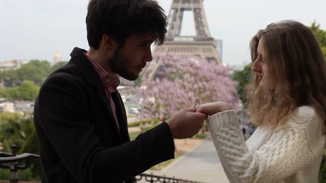 love in Paris, dating, affectionate young couple near Eiffel Tower