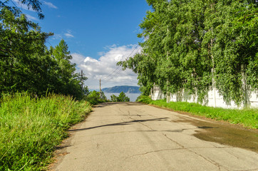 Road, forest, sky, clouds