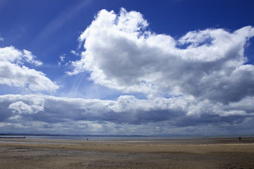 Fototapeta na wymiar Crosby beach in England landscape. Cloudy day