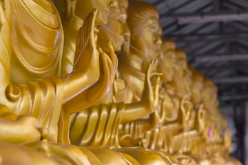 The hand of the Buddha from Thai craftsmanship is delicate and beautiful.