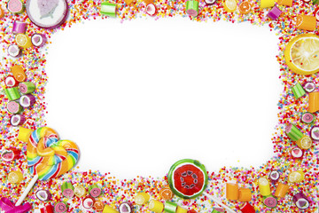 Frame of assorted candies and lollipops