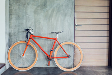 orange bicycle parked decorate interior living room modern style