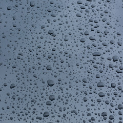 rain drops on car with glass coating protection skin