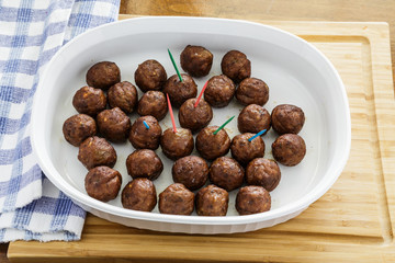 Browned Meatballs with Toothpicks with White Casserole