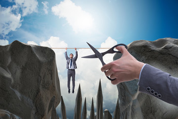 Competition concept with hanging businessman