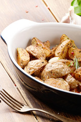 Ceramic dish with Fried potatoes