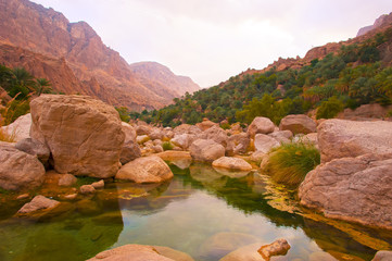 Mountain lake. The beautiful mountain scenery. Wadi Bani Khalid. Oman.