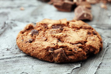 Chocolate cookies on wooden table. Chocolate chip cookies shot