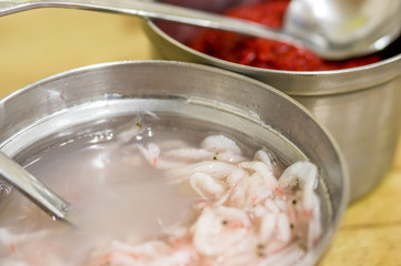 spices, salted shrimp and diced red peppers for a sundae gukbap, Korean blood sausage stew