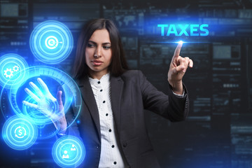 The concept of business, technology, the Internet and the network. A young entrepreneur working on a virtual screen of the future and sees the inscription: Taxes
