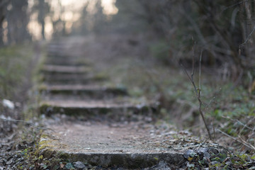 Old damaged stone staircase, up and down, textured background