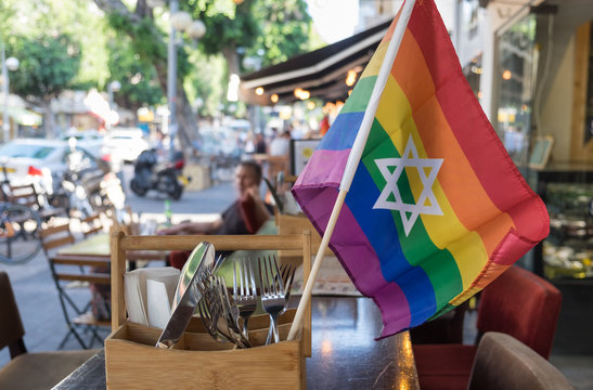 Rainbow flags with the jewish star of David at undefined cafe in Israel