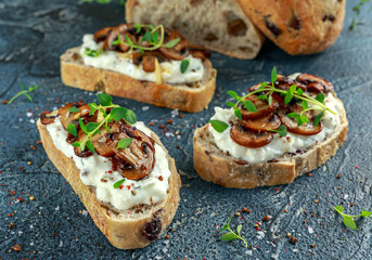 Garlic mushroom toast with creamy herbed ricotta chees spread