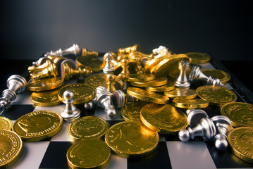 gold coin and chess