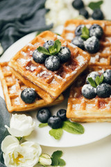 Belgian waffles with fresh berries and mint