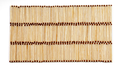 Three rows of many matches on white background view from above