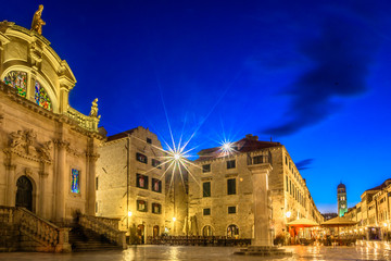 Fototapeta na wymiar Dubrovnik night scenery. / Night view at cathedral and promenade in town Dubrovnik famous european summer resort in Croatia.
