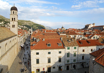 Obraz premium Bell Tower of Franciscan Church and Historic Buildings of the Old City of Dubrovnik, Croatia 
