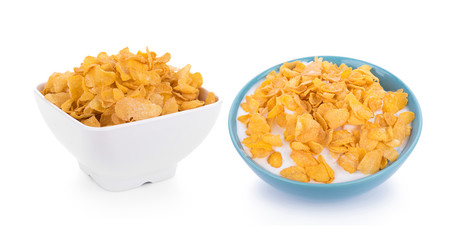 Corn flakes with milk isolated on white background