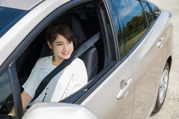 young woman sitting on assistant seat.