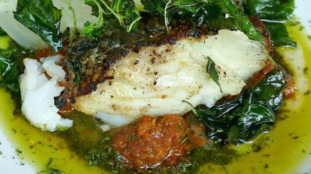 Sea bass steak with sauce
