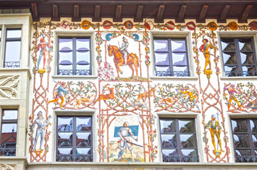 Beautiful painted facade with window shutters in the old town of Lucerne, Switzerland