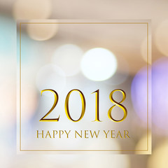 Happy New Year 2018 on abstract blur festive bokeh background with copy space for text