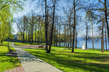 Summer Park on the shore of the pond