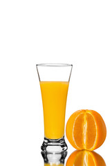glass of orange juice and sliced orange, mirror reflection, isolated background