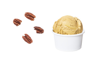 Butter Pecan Ice Cream in white cup and pieces of pecan nuts isolated on white background (clipping path included for each piece)