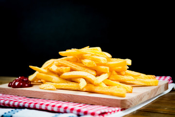 Golden French fries potatoes ready to be eaten