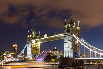 The Tower bridge in London illuminated at night