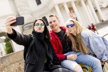 Young people taking selfie in Vienna, Austria