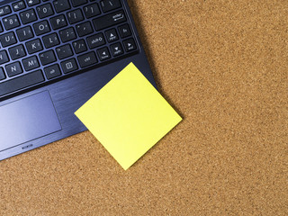 Sticky note on laptop keyboard