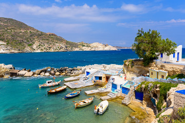 Obraz premium Picturesque fishing village of Mandrakia with traditional shelters for the boats (sirmata), Milos Island. Greece.