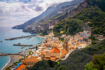 Naklejka na ściany i meble Cityscape view of Amalfi with colorful houses and ocean coastline