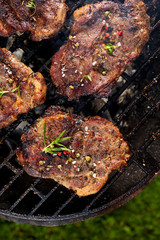 Grilled pork neck steak. Roast pork while grilling