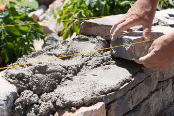 Stone wall under construction