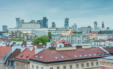 Warsaw, Poland, panorama of city center with modern skyscrapers and old city roofs